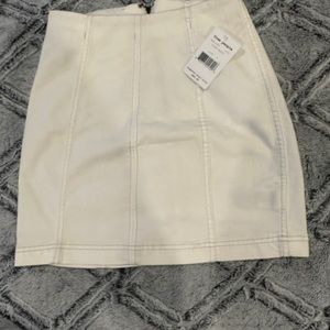 Free People White Denim Mini- Size 4. BRAND NEW; TAGS ON.